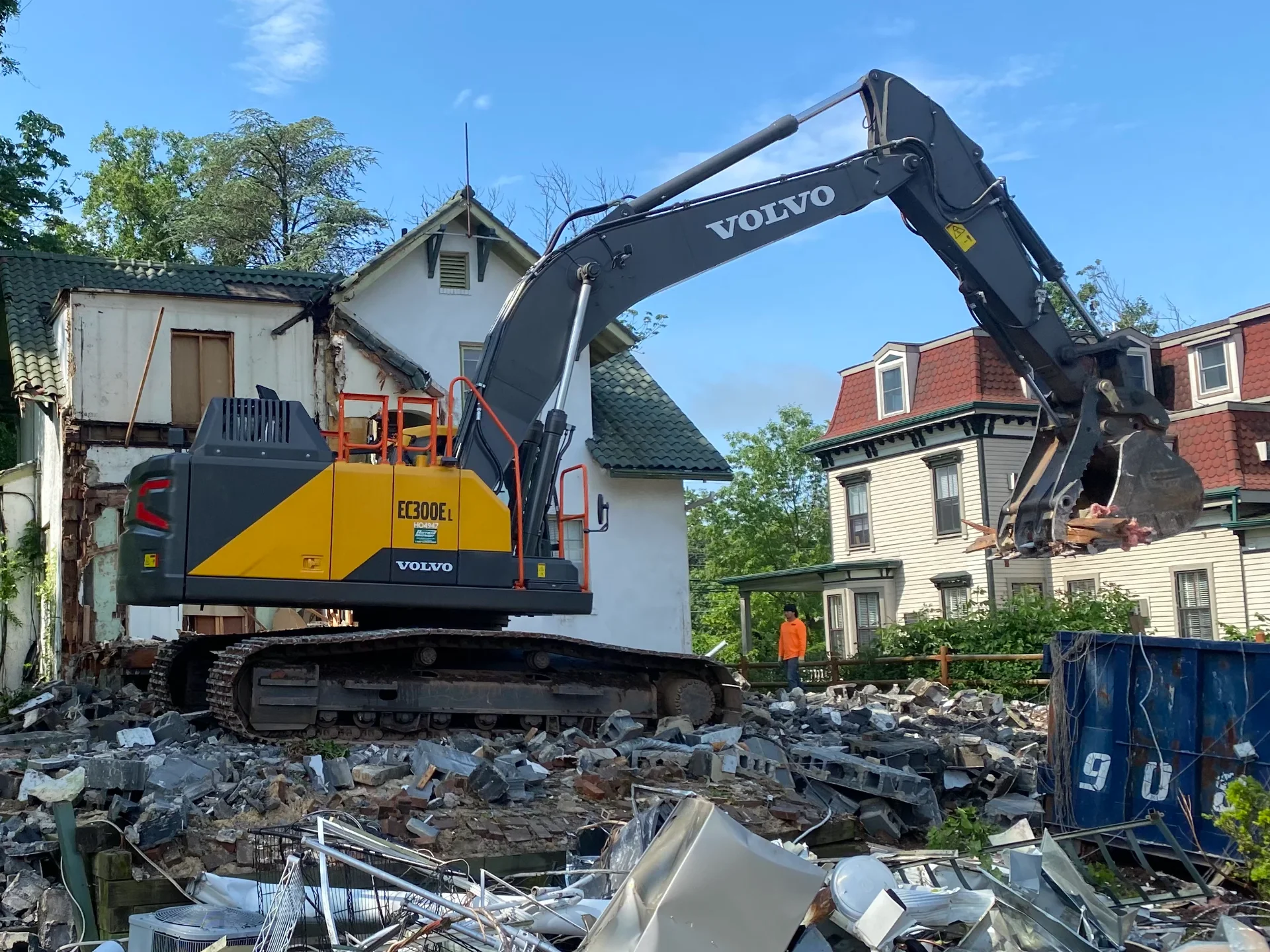 Excavator demo of house